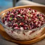 Cranberry Jalapeno Cream Cheese Dip served in a bowl with crackers