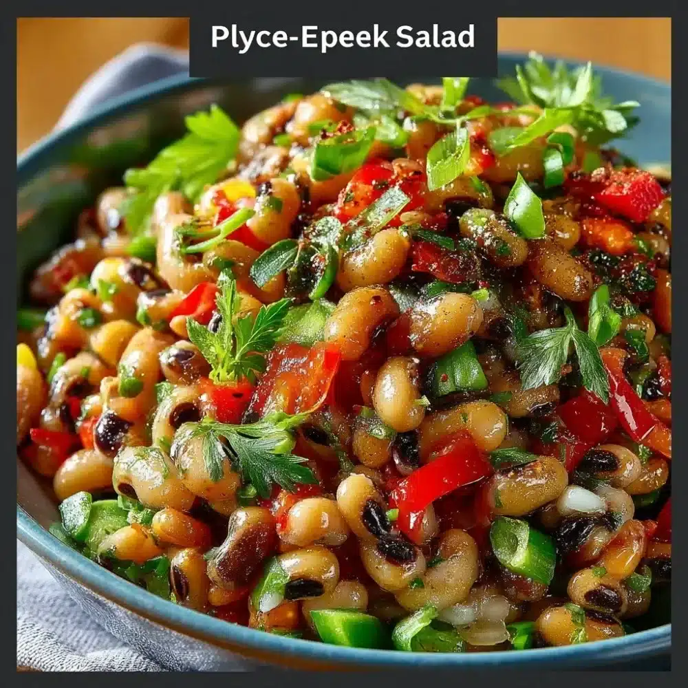 Bowl of spicy Black-Eyed Pea Salad with vibrant vegetables and spices.